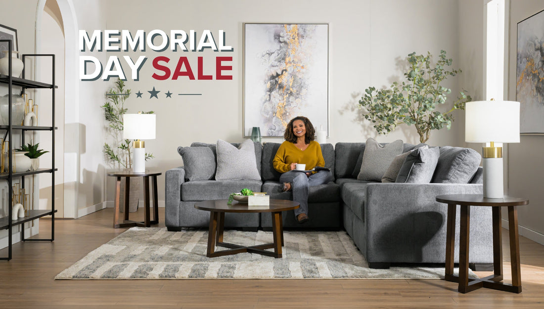Woman sitting on a sectional sofa in a living room 