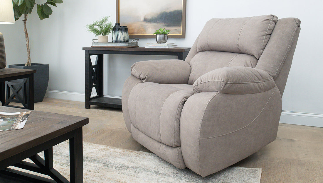 A beige recliner in a living room.