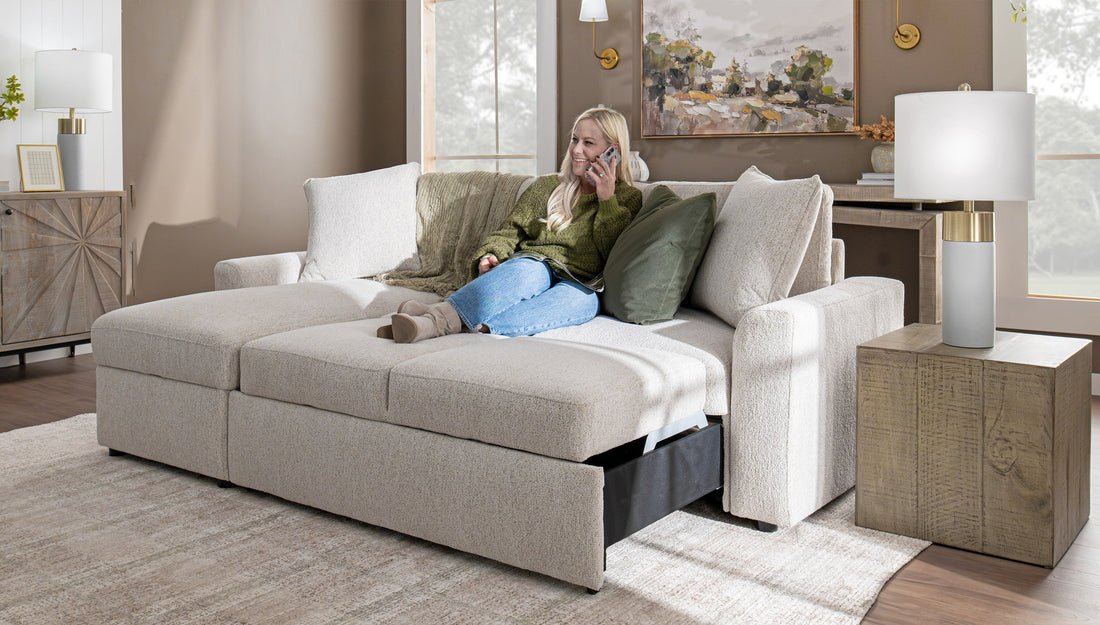 A woman sitting on a couch in a living room